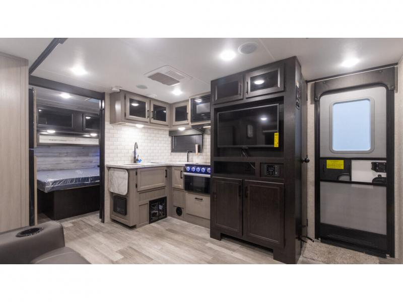 Kitchen and entertainment center in the Jayco Jay Feather travel trailer